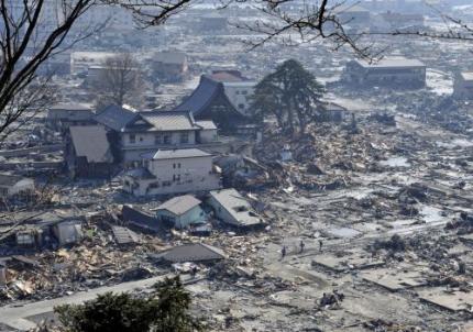 Overlevenden in puin Japanse stad