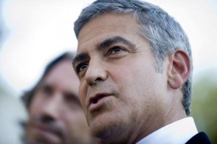 'Clooney was bij seksfeestje Berlusconi'