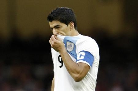 Suarez in zijn kruis getast