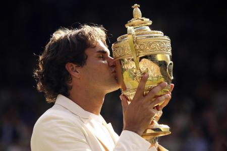 Recordhouder Roger Federer heeft zeven enkeltitels op zijn naam staan. Hier zie je hem na zijn overwinning in 2006 (Foto: Pro Shots)