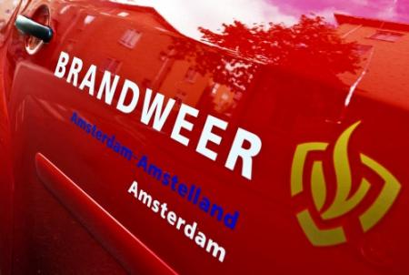 Man gewond door brand in woning Amsterdam
