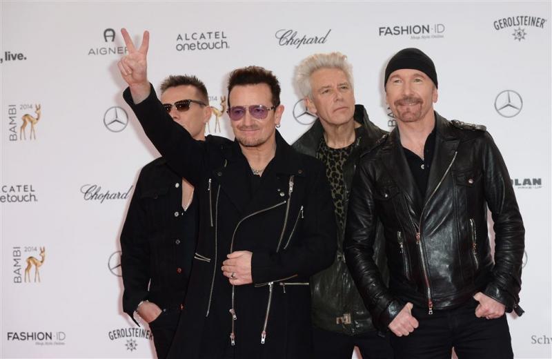 'U2 in rondvaartboot en Amsterdams café'