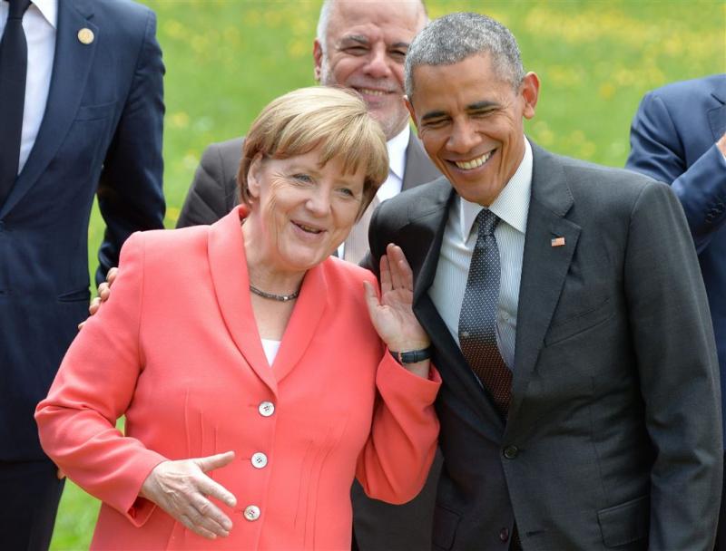 Obama en Merkel voor verdeling vluchtelingen