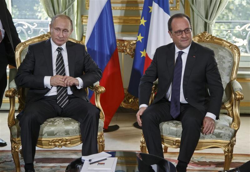 Kille blikken bij ontmoeting Hollande-Poetin
