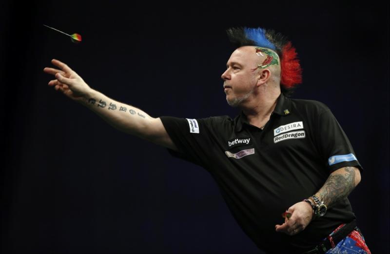 Peter Wright pakt de dagzege in Barnsley. (PRO SHOTS/Action Images)