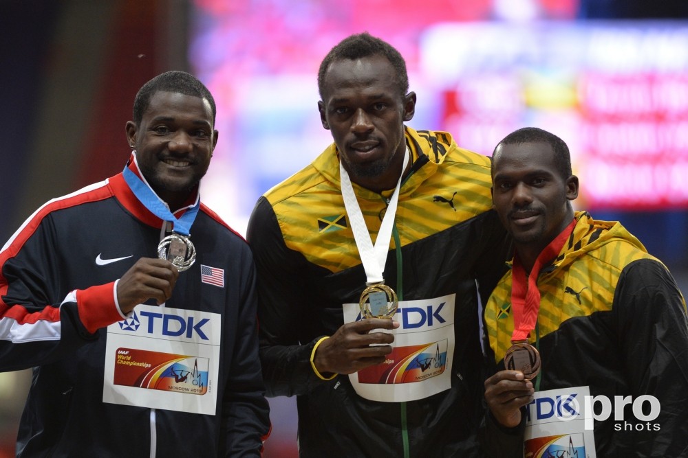 Nesta Carter won in 2013 op het WK brons op de 100 meter, achter Usain Bolt en Justin Gatlin (PROSHOTS/DPPI)