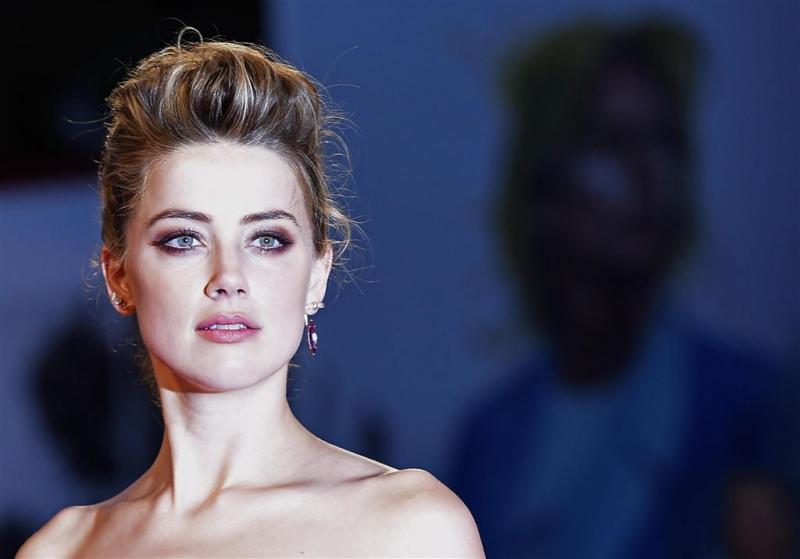 Amber Heard vroeger gearresteerd voor klap