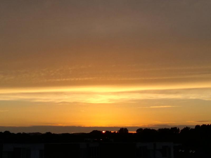 Zonsondergang boven Alkmaar (Foto: Papabear)