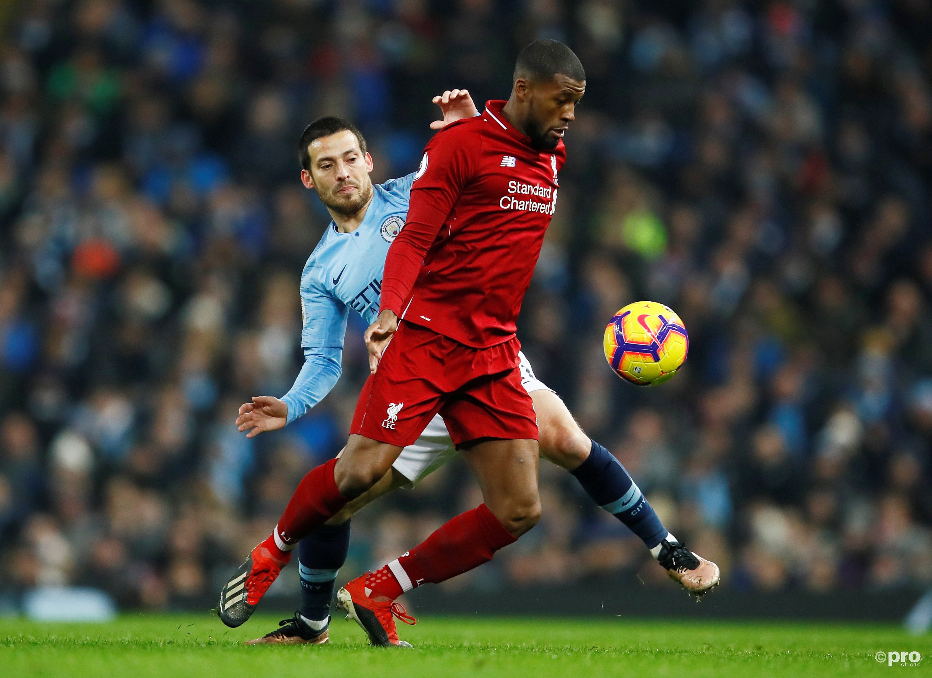 Wijnaldum in duel met Silva. (PRO SHOTS/Action Images)